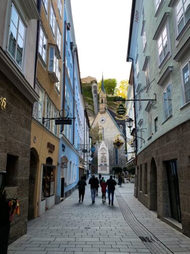 Salzburg's old street with timeless traditional shops. Kaelie Piscitello Photos